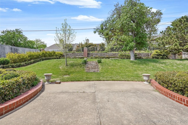 6020 S Marion Pl, Tulsa, OK 74135 - view of yard featuring a patio and fence