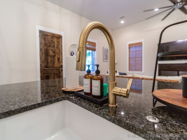 31 Park St, Carlton Landing, OK 74432 - details featuring a ceiling fan, recessed lighting, and dark stone counters