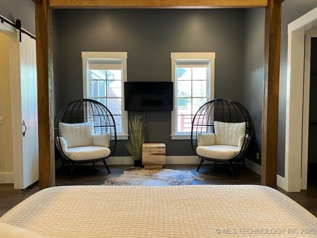 31 Park St, Carlton Landing, OK 74432 - bedroom with a barn door and baseboards