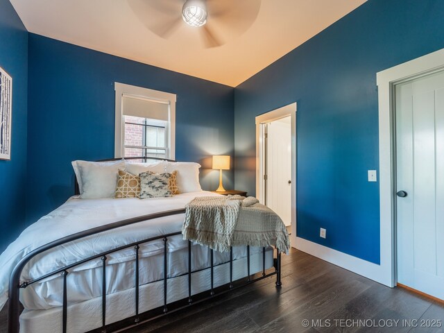 31 Park St, Carlton Landing, OK 74432 - bedroom with baseboards, a ceiling fan, and wood finished floors