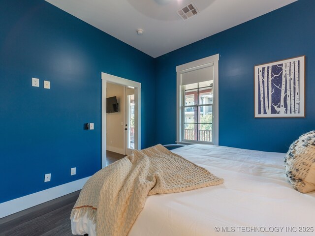 31 Park St, Carlton Landing, OK 74432 - bedroom with dark wood finished floors, baseboards, and visible vents