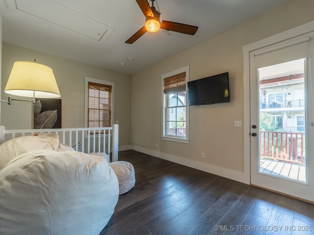 31 Park St, Carlton Landing, OK 74432 - living area with attic access, a ceiling fan, wood finished floors, and baseboards