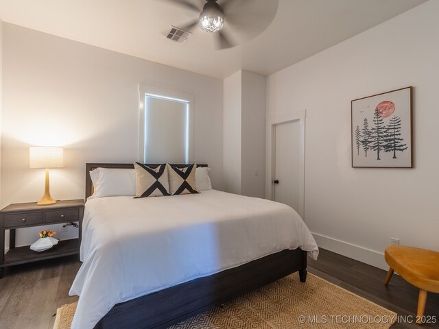 31 Park St, Carlton Landing, OK 74432 - bedroom featuring wood finished floors, visible vents, baseboards, and ceiling fan