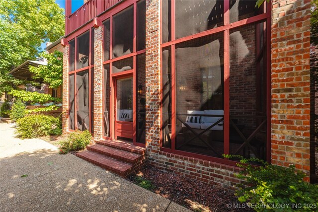 31 Park St, Carlton Landing, OK 74432 - property entrance featuring brick siding