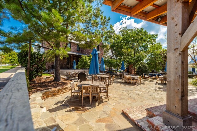 31 Park St, Carlton Landing, OK 74432 - view of patio featuring outdoor dining area