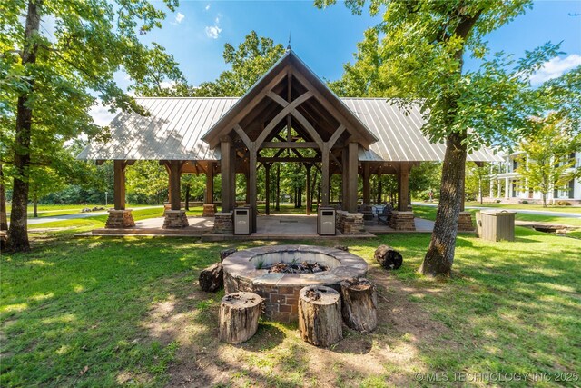 31 Park St, Carlton Landing, OK 74432 - view of home's community with a lawn, an outdoor fire pit, and a gazebo