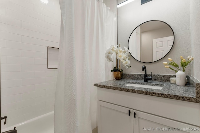 8219 S 67th W Ave, Tulsa, OK 74066 - bathroom with vanity and shower / tub combo