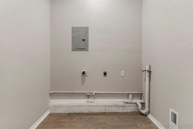 8219 S 67th W Ave, Tulsa, OK 74066 - clothes washing area with visible vents, laundry area, wood finished floors, electric panel, and hookup for an electric dryer