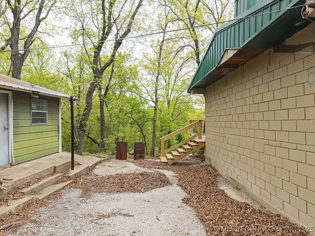 view of yard featuring stairway