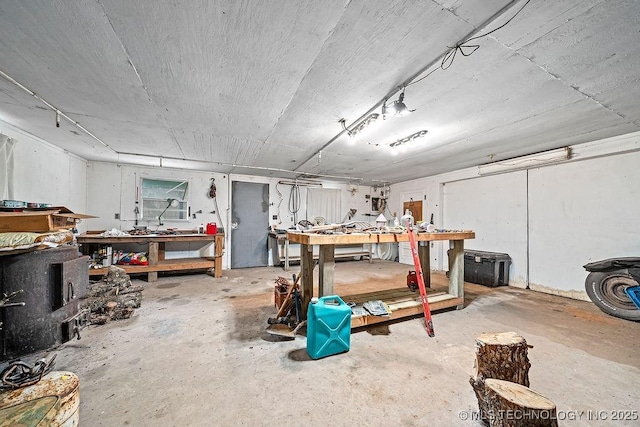 basement with a workshop area