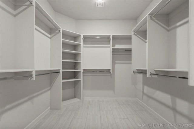 spacious closet with visible vents