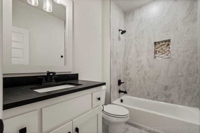 full bathroom featuring toilet, shower / bathtub combination, and vanity