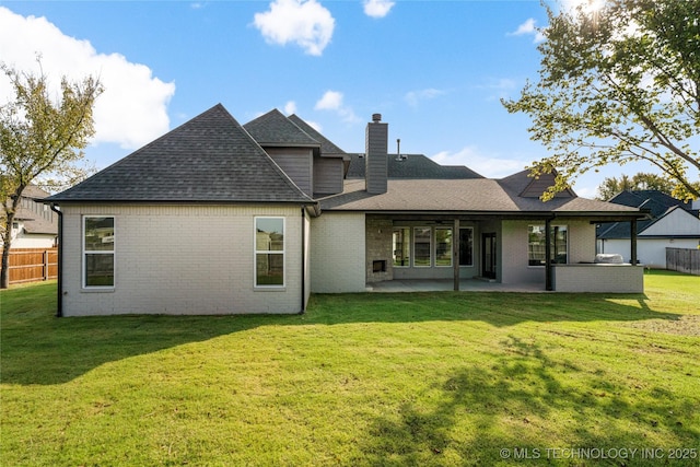13676 S 23rd St, Bixby, OK 74008 - back of house with a patio, a chimney, a shingled roof, brick siding, and ceiling fan