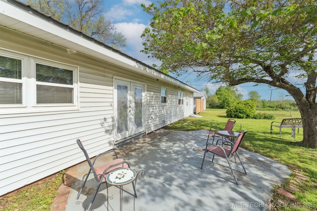 904 N Morningside Dr, Vinita, OK 74301 - view of patio featuring french doors
