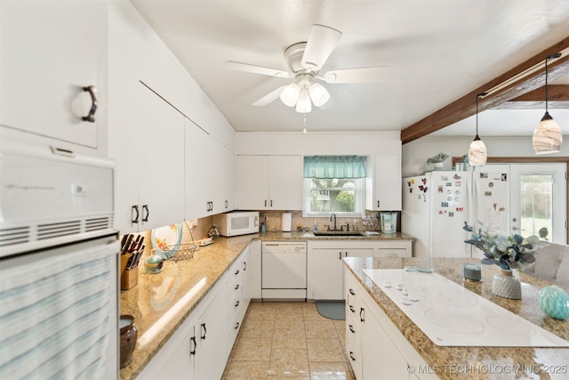 904 N Morningside Dr, Vinita, OK 74301 - kitchen with backsplash, a sink, white appliances, and white cabinets