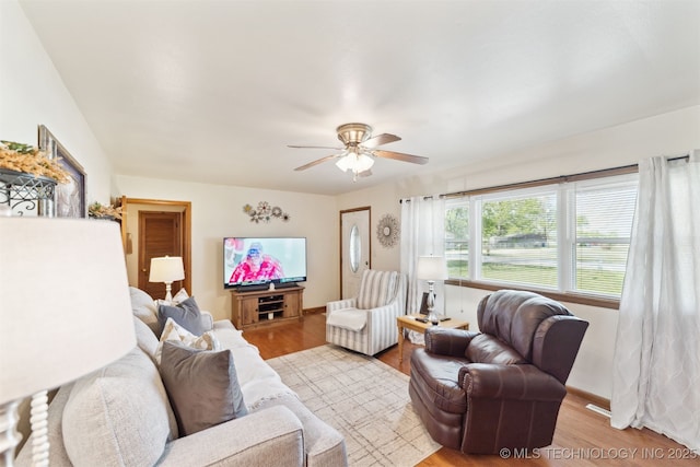 904 N Morningside Dr, Vinita, OK 74301 - living area featuring light wood finished floors, baseboards, and ceiling fan