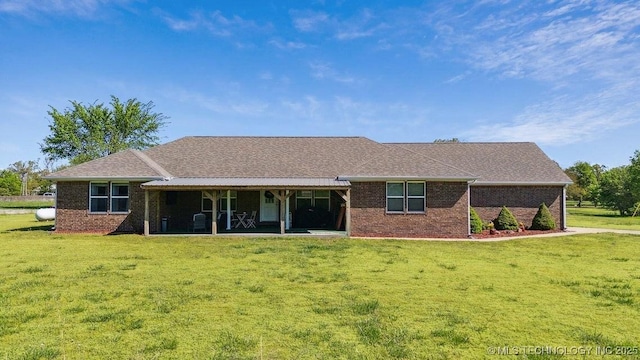 35041 Cohea Ln, Ketchum, OK 74331 - ranch-style house with brick siding and a front yard