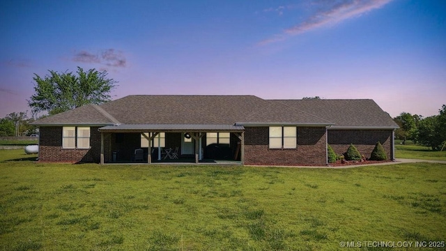 35041 Cohea Ln, Ketchum, OK 74331 - view of front of house featuring brick siding and a front yard