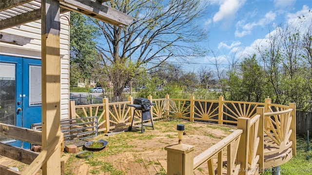 view of yard featuring a wooden deck and a fenced backyard