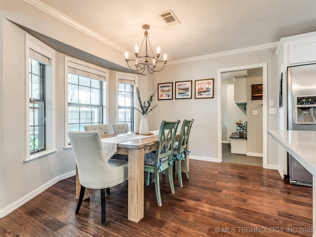 dining space featuring an inviting chandelier, dark wood-style flooring, visible vents, and baseboards