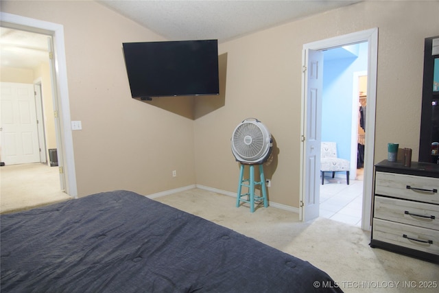 705 S Garfield Ave, Wagoner, OK 74467 - bedroom with baseboards and carpet floors