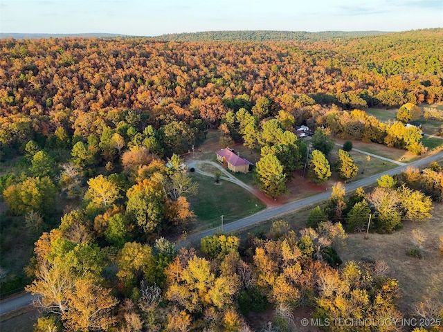 drone / aerial view with a forest view