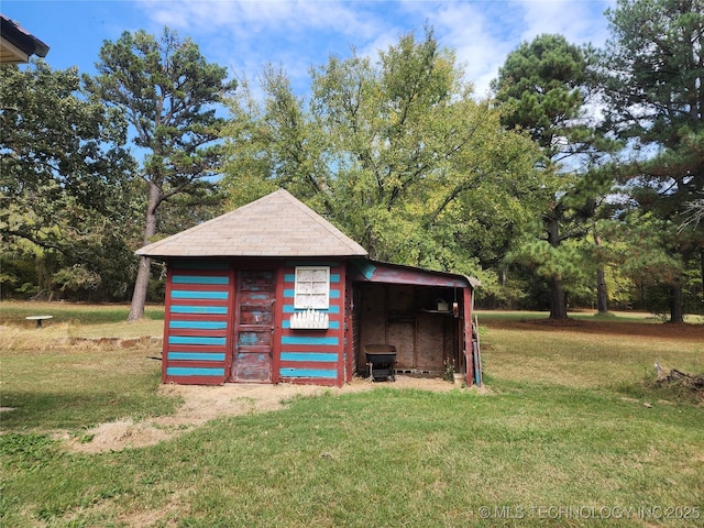 view of outbuilding with an outbuilding