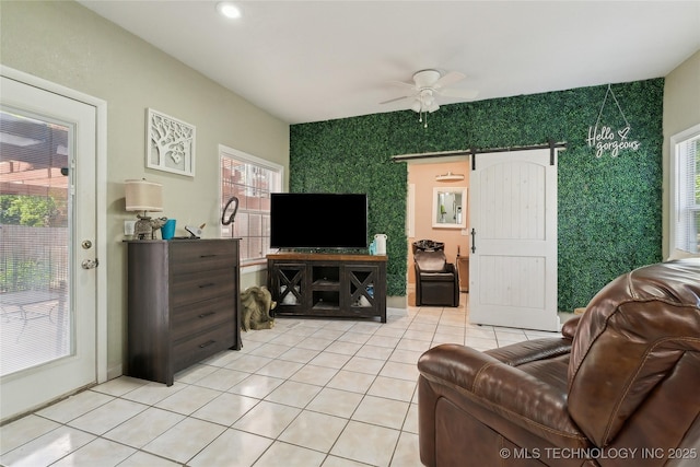 living room featuring recessed lighting, ceiling fan, and light tile patterned floors