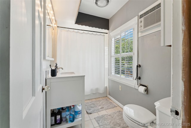 full bath featuring toilet, visible vents, curtained shower, tile patterned flooring, and vanity