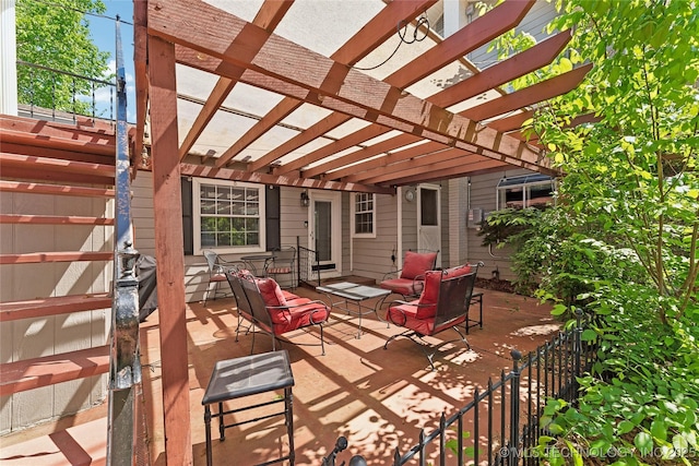 view of patio / terrace featuring a pergola and an outdoor living space