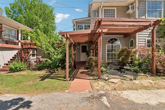 view of front of house featuring stairway