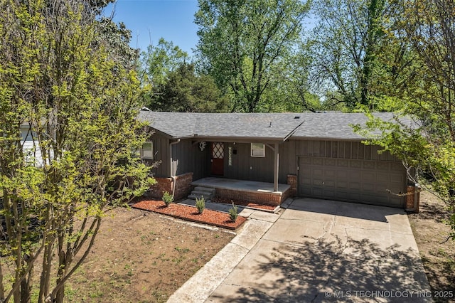 507 W Quincy St, Broken Arrow, OK 74012 - single story home featuring an attached garage, driveway, board and batten siding, roof with shingles, and brick siding