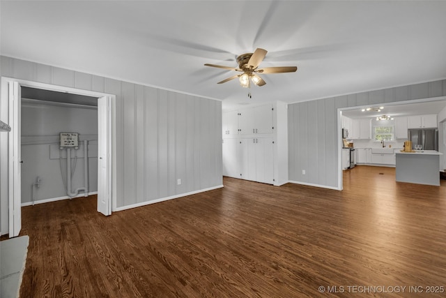 507 W Quincy St, Broken Arrow, OK 74012 - unfurnished living room with a ceiling fan, dark wood-type flooring, a sink, crown molding, and baseboards