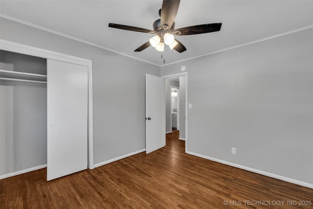 507 W Quincy St, Broken Arrow, OK 74012 - unfurnished bedroom featuring wood finished floors, baseboards, crown molding, a closet, and a ceiling fan