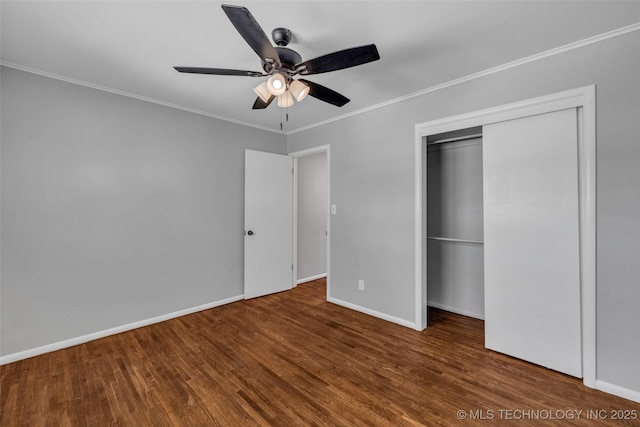 507 W Quincy St, Broken Arrow, OK 74012 - unfurnished bedroom featuring wood finished floors, crown molding, baseboards, ceiling fan, and a closet