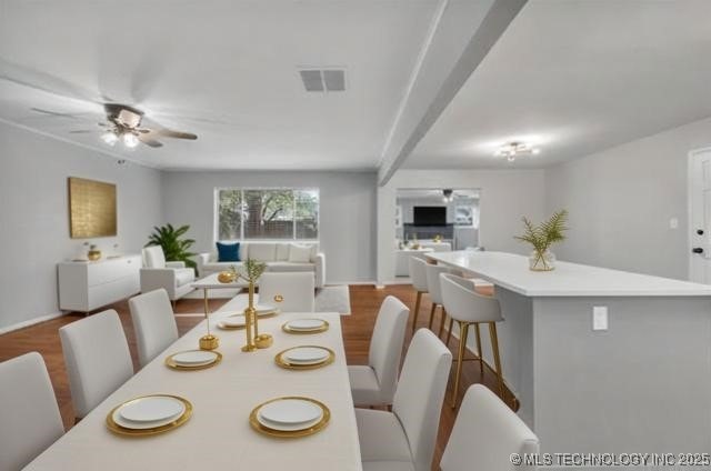 507 W Quincy St, Broken Arrow, OK 74012 - dining area featuring a ceiling fan, wood finished floors, and baseboards