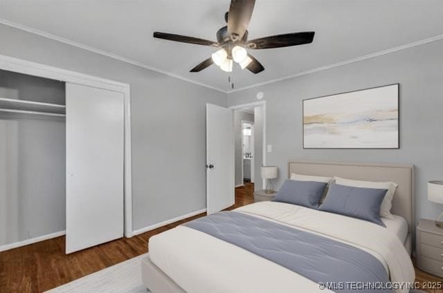 507 W Quincy St, Broken Arrow, OK 74012 - bedroom with wood finished floors, crown molding, a closet, baseboards, and a ceiling fan