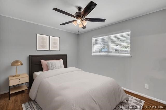 507 W Quincy St, Broken Arrow, OK 74012 - bedroom featuring baseboards, dark wood-style flooring, and a ceiling fan