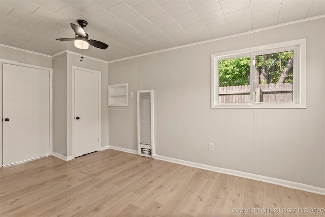 3224 S Darlington Ave, Tulsa, OK 74135 - unfurnished bedroom featuring a heating unit, wood finished floors, baseboards, and ornamental molding