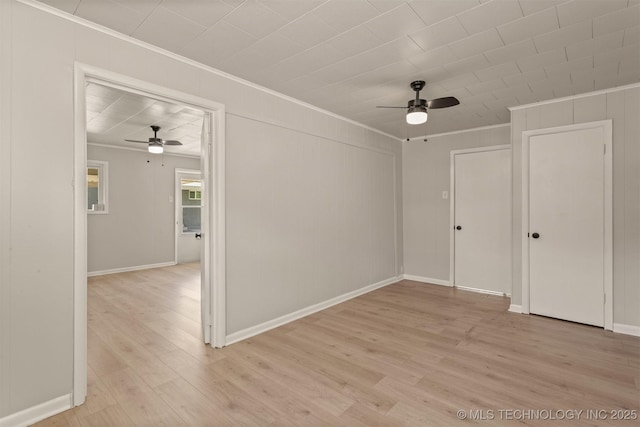 3224 S Darlington Ave, Tulsa, OK 74135 - interior space with crown molding, light wood-style flooring, baseboards, and ceiling fan