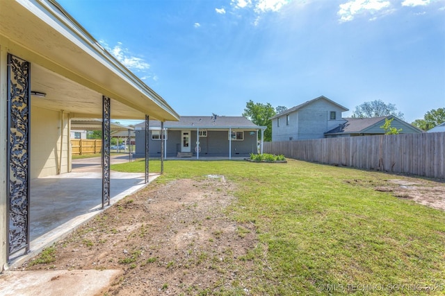 3224 S Darlington Ave, Tulsa, OK 74135 - view of yard featuring a patio and a fenced backyard