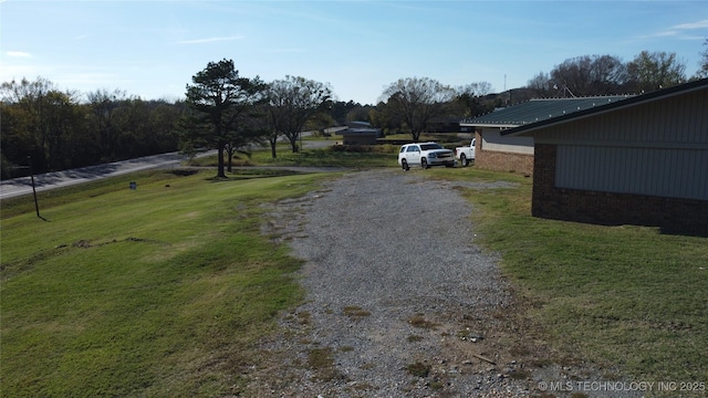 view of road featuring driveway