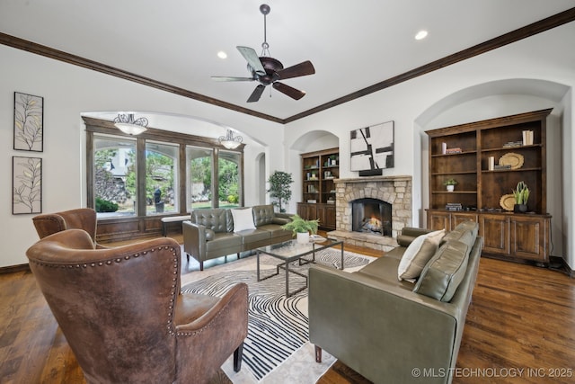 10626 S Joplin Ave, Tulsa, OK 74137 - living area featuring ornamental molding, wood finished floors, recessed lighting, ceiling fan, and a stone fireplace