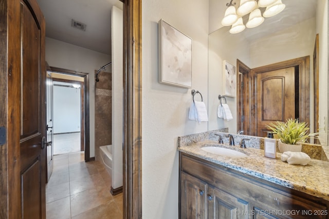 10626 S Joplin Ave, Tulsa, OK 74137 - full bath with vanity, shower / tub combination, tile patterned flooring, and a chandelier