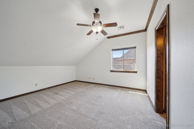 10626 S Joplin Ave, Tulsa, OK 74137 - additional living space featuring carpet floors, ceiling fan, baseboards, and lofted ceiling