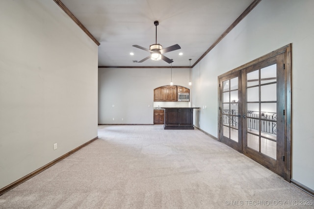 10626 S Joplin Ave, Tulsa, OK 74137 - unfurnished living room featuring french doors, ornamental molding, light carpet, baseboards, and ceiling fan