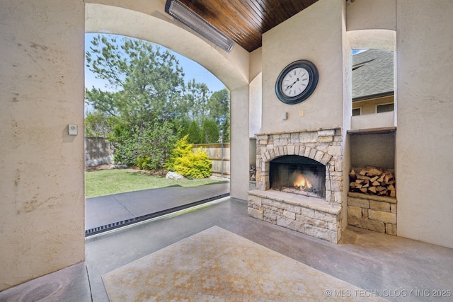 10626 S Joplin Ave, Tulsa, OK 74137 - view of patio with an outdoor stone fireplace