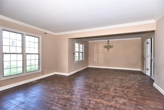 6903 E 63rd St, Tulsa, OK 74133 - empty room featuring wood finished floors, a chandelier, baseboards, plenty of natural light, and crown molding