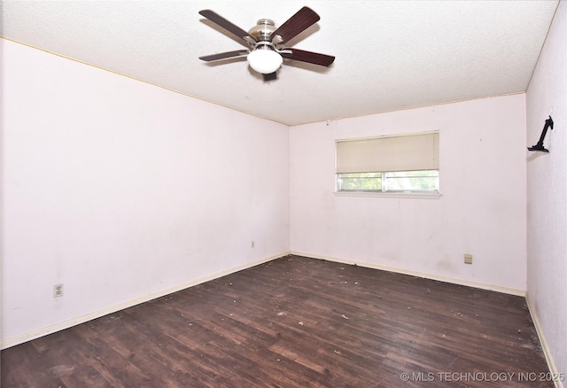 6903 E 63rd St, Tulsa, OK 74133 - spare room featuring wood finished floors, a ceiling fan, baseboards, and a textured ceiling