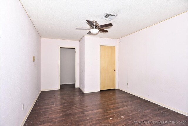 6903 E 63rd St, Tulsa, OK 74133 - empty room with a ceiling fan, wood finished floors, baseboards, and a textured ceiling
